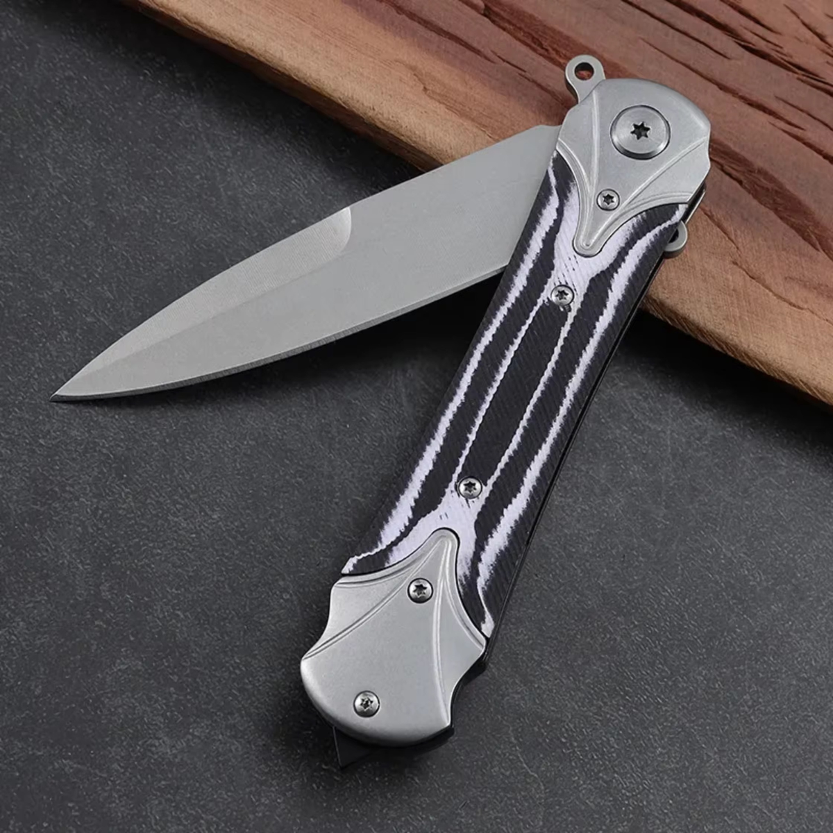 Navaja táctica EDC con rompevidrio, clip y hoja de acero afilada - foto 4