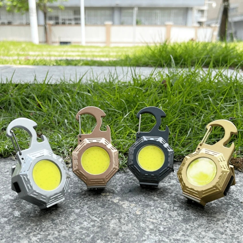 Llavero multifuncional con luz LED blanca y luz SOS roja, modelo KDL0 - foto 4