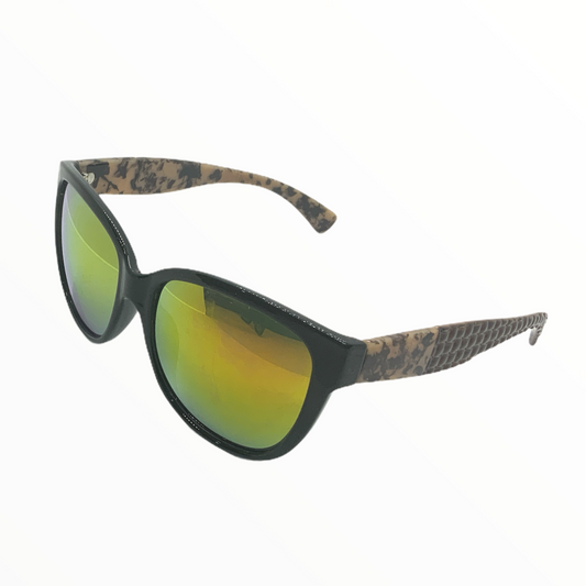 Lentes de sol para dama con armazón redondo y detalle de filigrana