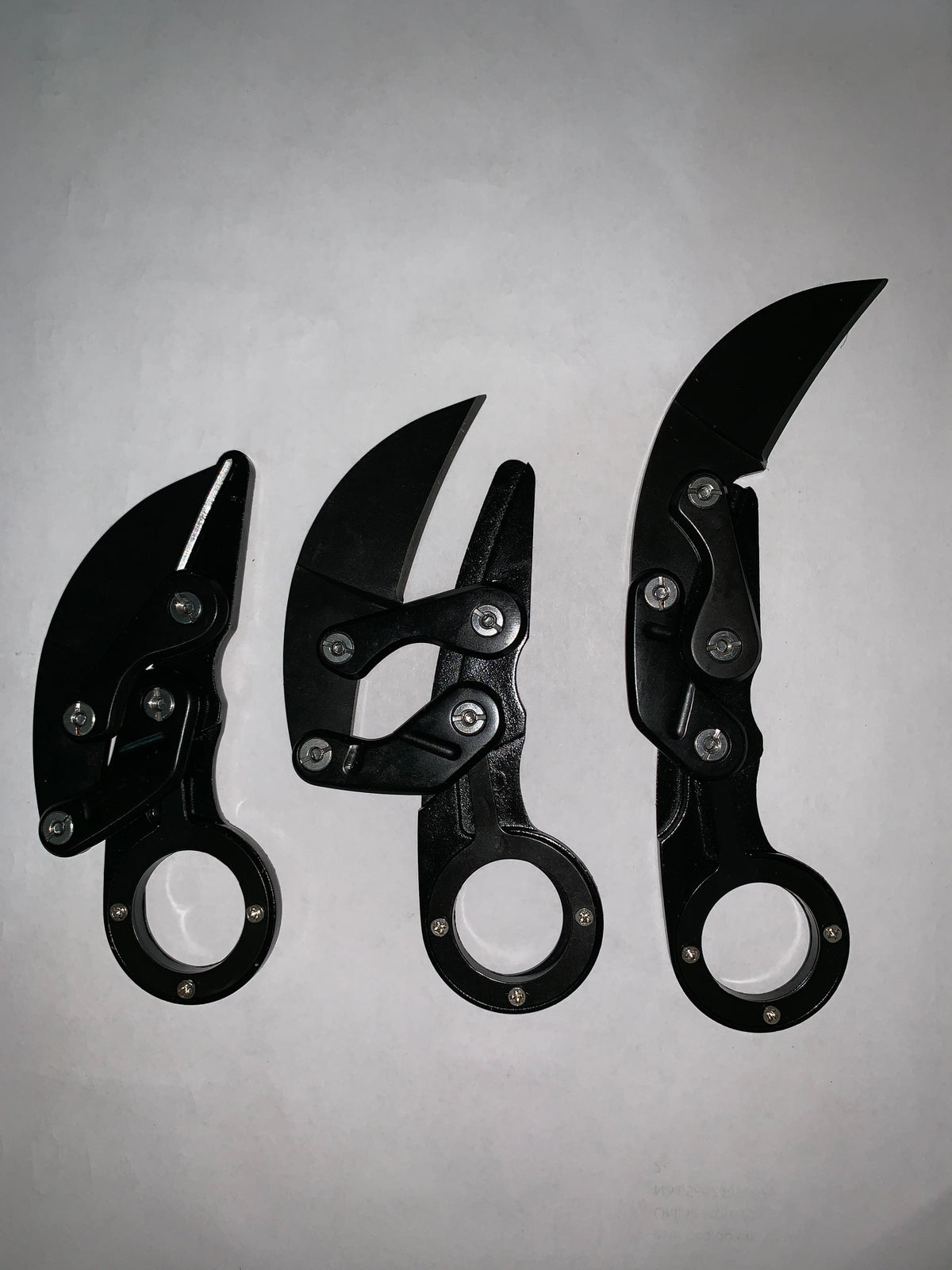 Cuchillo retráctil tipo karambit H105 para colección y campismo